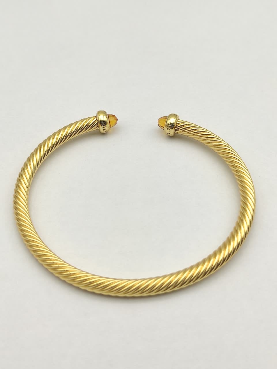David Yurman Gold Tone Wire Bangle Bracelet with Orange Crystal Accents